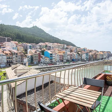 アパート Atico Con Vistas Inmejorables Al Puerto ア・グアルダ